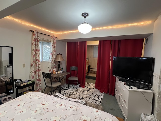 bedroom featuring carpet flooring and visible vents