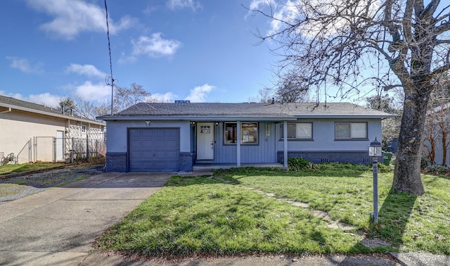 ranch-style house featuring concrete driveway, brick siding, an attached garage, and a front yard