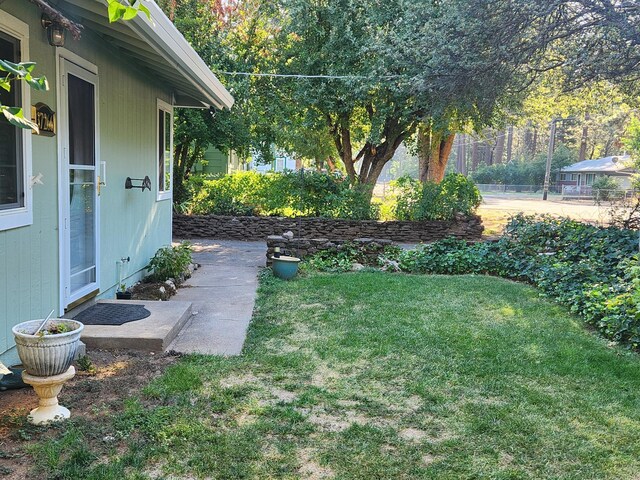 view of yard with fence