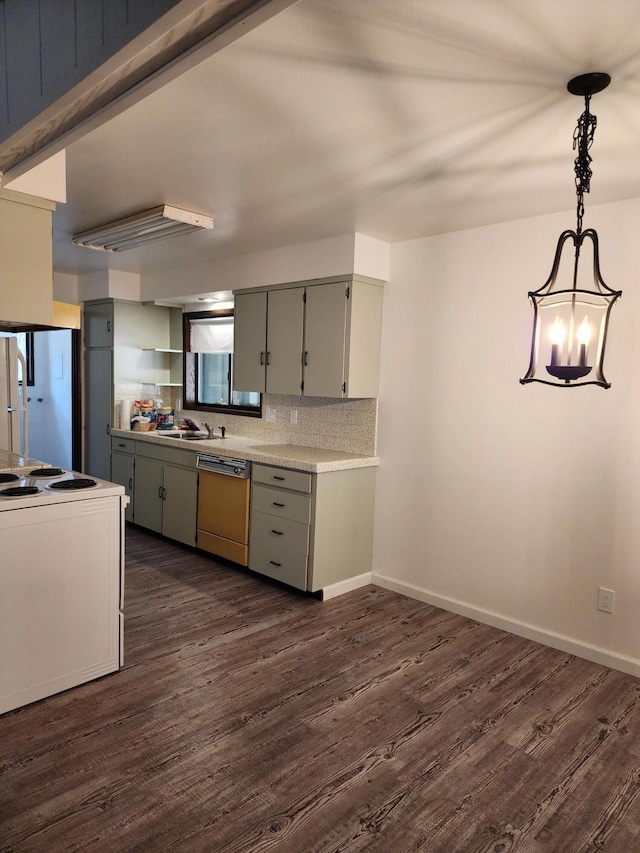 kitchen featuring dark wood finished floors, tasteful backsplash, light countertops, stove, and dishwasher