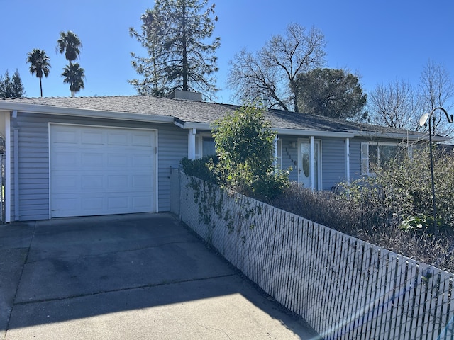 view of front of house featuring driveway and an attached garage