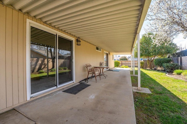 view of patio / terrace with fence