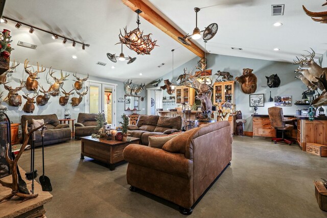 living area with vaulted ceiling with beams, visible vents, and concrete flooring