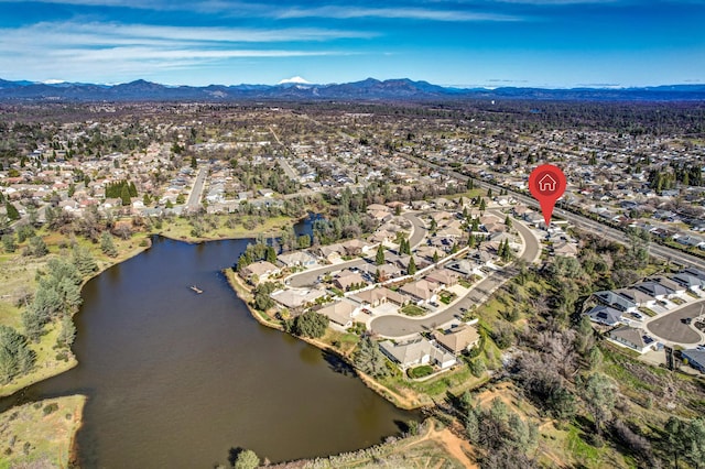 aerial view with a residential view and a water and mountain view