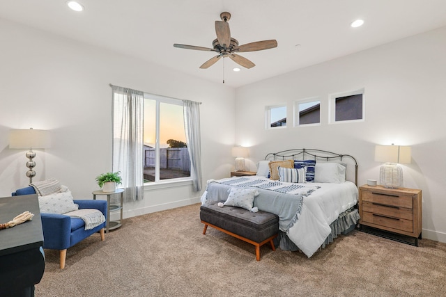 carpeted bedroom featuring baseboards, a ceiling fan, and recessed lighting