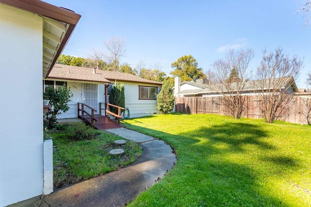 view of yard with fence