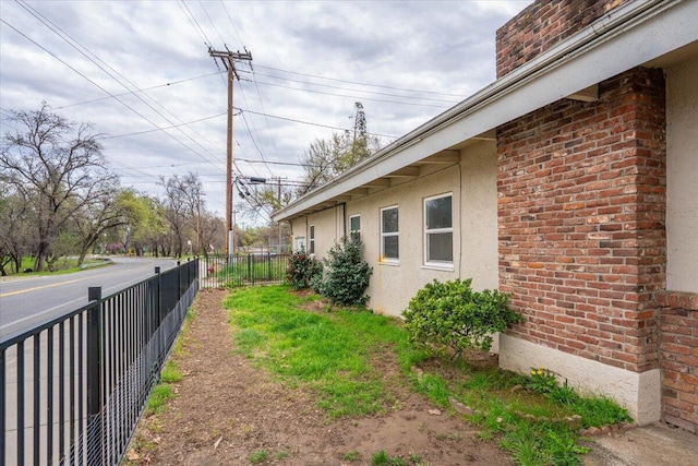 view of yard featuring fence