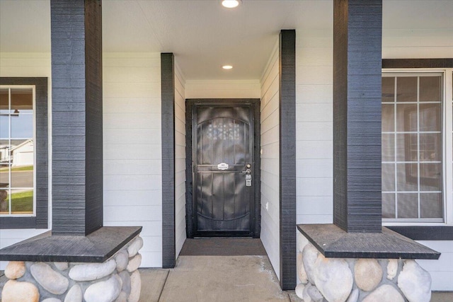 doorway to property featuring a porch