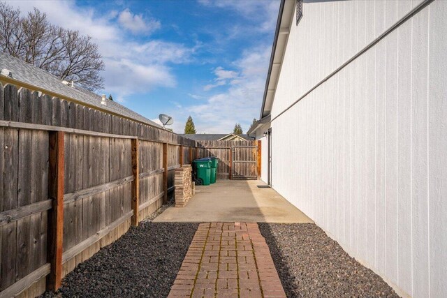 view of yard with a patio and a fenced backyard