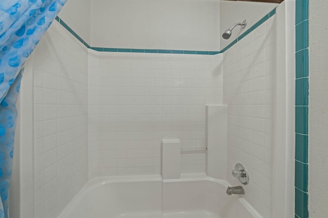 full bath with shower / bathtub combination with curtain