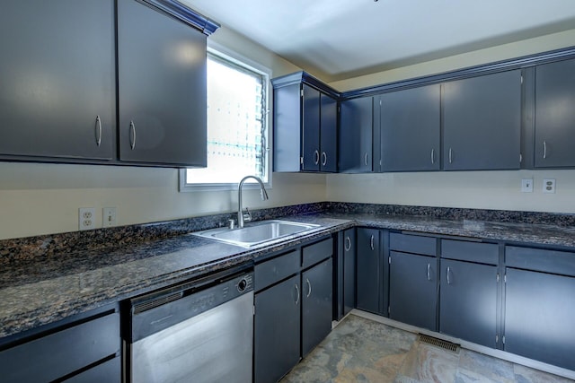 kitchen with dishwasher, blue cabinetry, and a sink