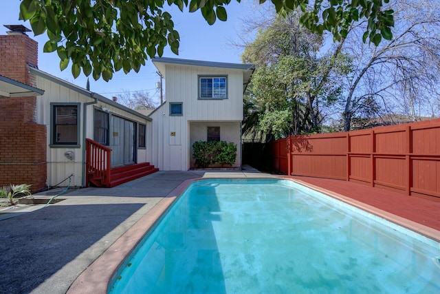 view of pool with fence and a fenced in pool