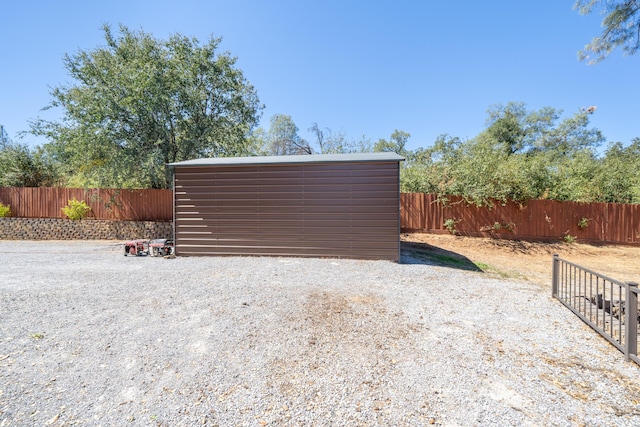 garage with fence