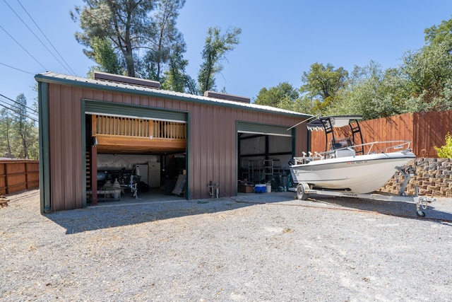 detached garage with fence