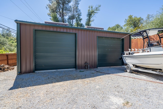 detached garage with fence