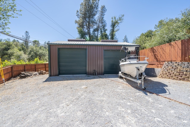 detached garage with fence