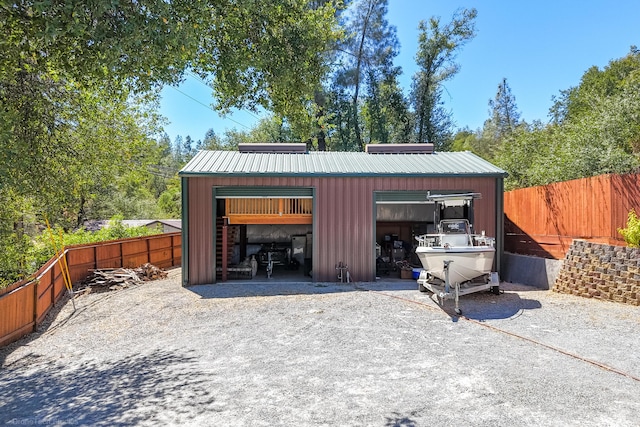 detached garage with fence