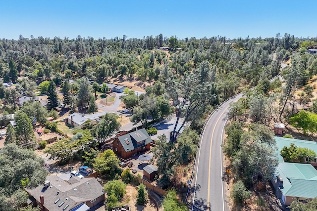 bird's eye view with a forest view