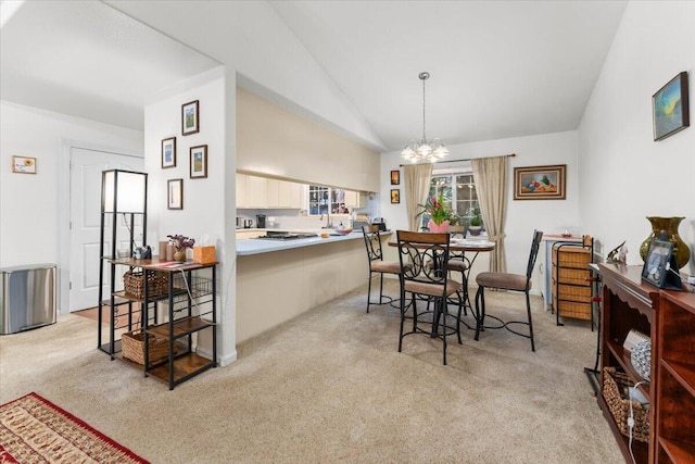 dining space featuring light carpet, high vaulted ceiling, and a notable chandelier