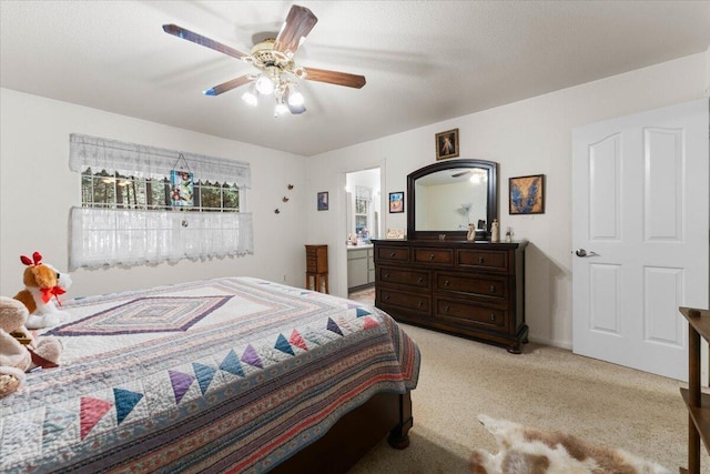 bedroom with light colored carpet and a ceiling fan