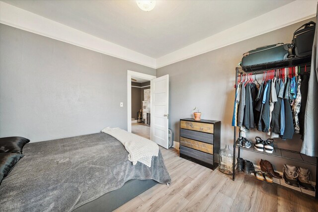 bedroom featuring wood finished floors