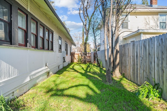 view of yard featuring a fenced backyard