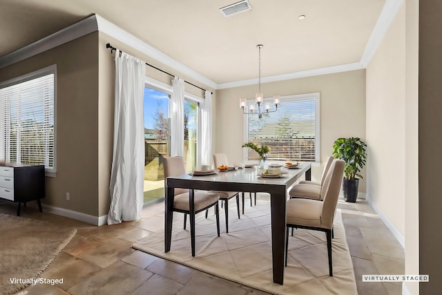 dining area featuring a chandelier, visible vents, baseboards, and ornamental molding