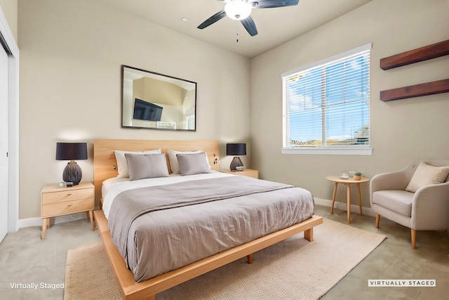 bedroom with light colored carpet, baseboards, and ceiling fan