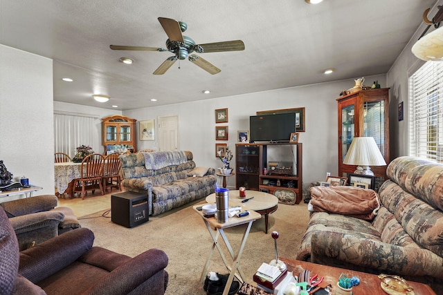 living room featuring a ceiling fan, carpet flooring, and recessed lighting