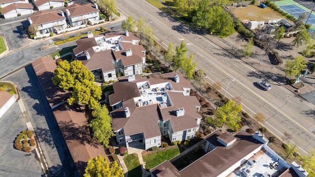 birds eye view of property with a residential view