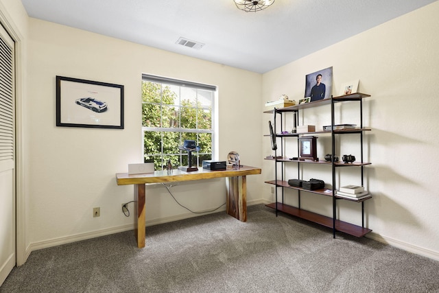 carpeted office featuring baseboards and visible vents