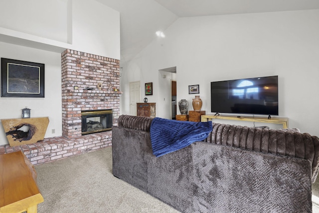 living area with a brick fireplace, high vaulted ceiling, and carpet floors