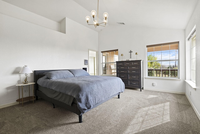 carpeted bedroom with visible vents, an inviting chandelier, high vaulted ceiling, and baseboards