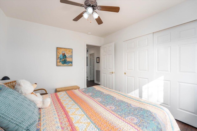 bedroom with a closet and a ceiling fan