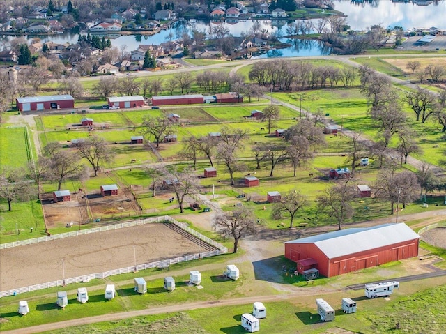 drone / aerial view with a rural view and a water view