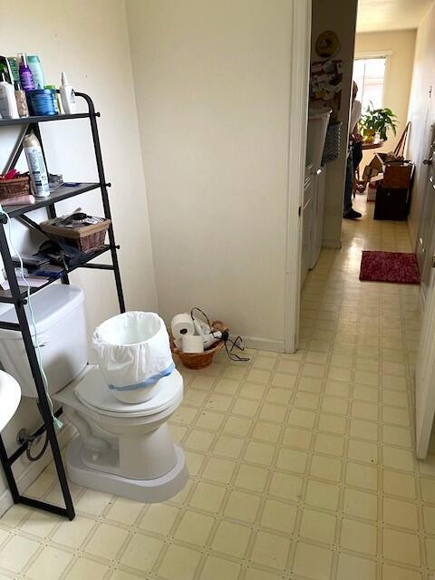 bathroom with tile patterned floors and toilet