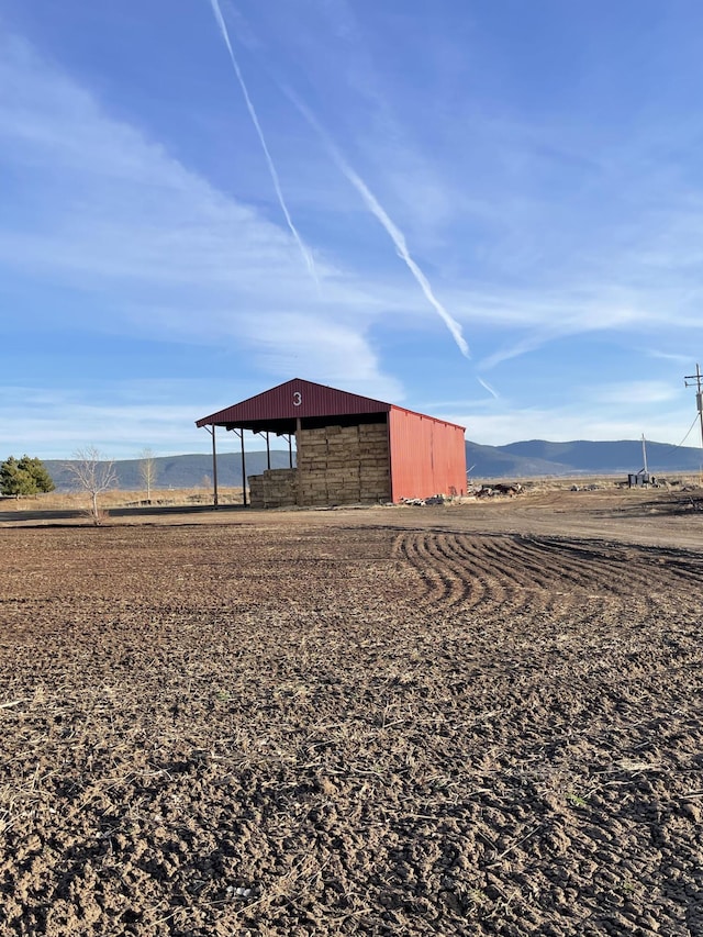 view of pole building featuring a mountain view