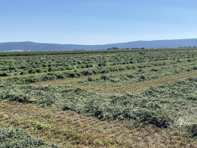 property view of mountains featuring a rural view