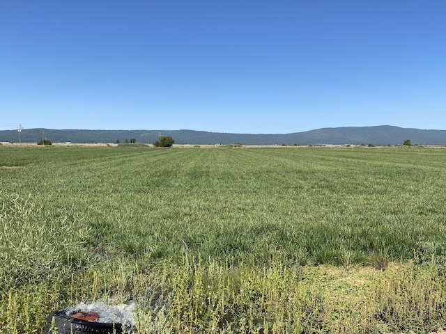 property view of mountains with a rural view