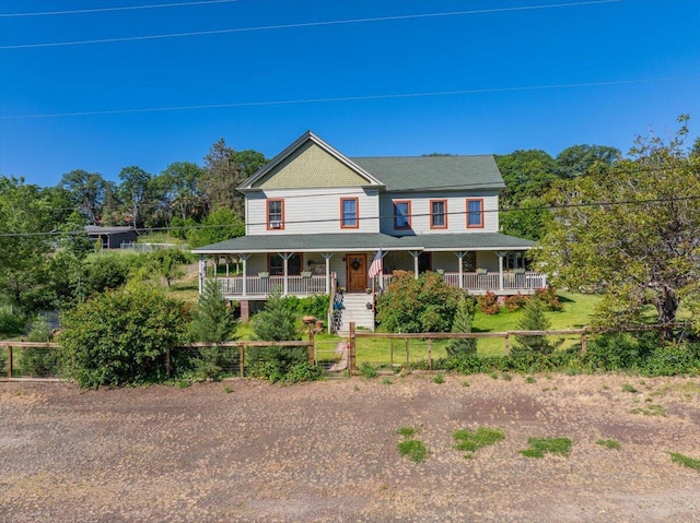 24894 Long St, Fall River Mills, CA 96028 - view of front of house with covered porch and a fenced front yard