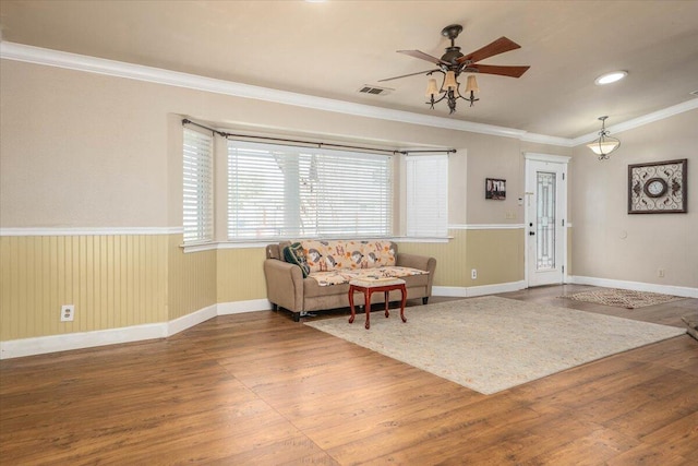 6040 Hornbeck Ln, Anderson, CA 96007 - sitting room featuring visible vents, a wainscoted wall, wood finished floors, and crown molding