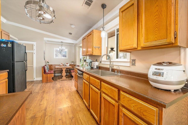 6040 Hornbeck Ln, Anderson, CA 96007 - kitchen featuring visible vents, freestanding refrigerator, ornamental molding, a sink, and a notable chandelier
