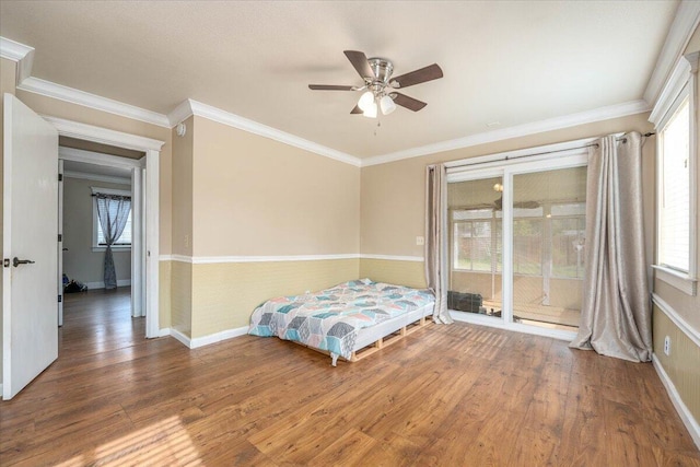 6040 Hornbeck Ln, Anderson, CA 96007 - unfurnished bedroom featuring hardwood / wood-style floors, crown molding, a ceiling fan, and baseboards