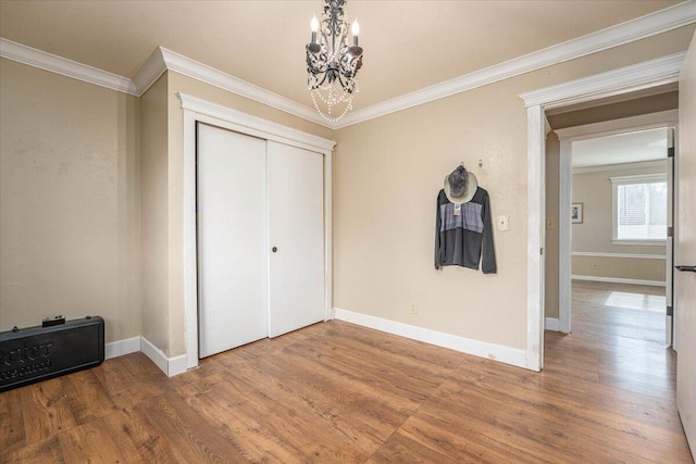 6040 Hornbeck Ln, Anderson, CA 96007 - bedroom with a chandelier, crown molding, and wood finished floors