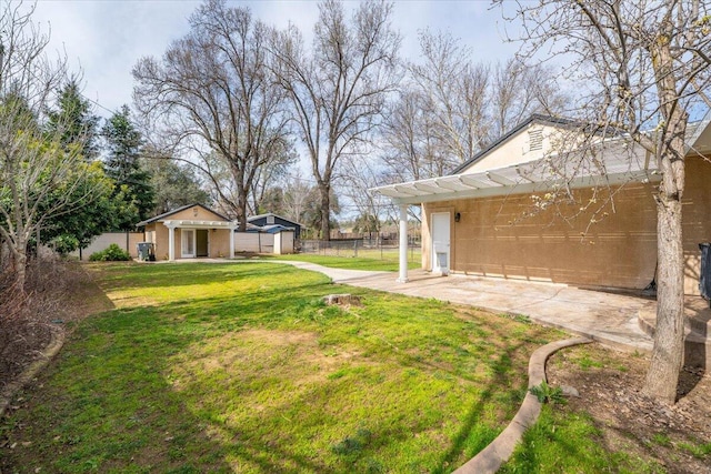 6040 Hornbeck Ln, Anderson, CA 96007 - view of yard with an outbuilding and fence
