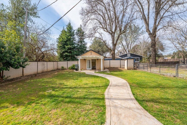 6040 Hornbeck Ln, Anderson, CA 96007 - view of yard with an outbuilding and a fenced backyard