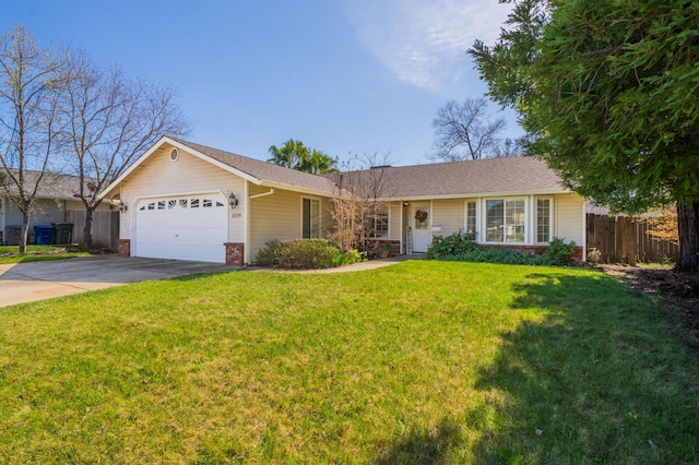 ranch-style house featuring a front yard, fence, driveway, an attached garage, and brick siding