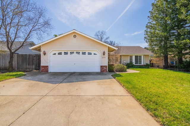 single story home featuring brick siding, concrete driveway, a front lawn, and fence