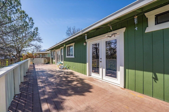 wooden deck with french doors