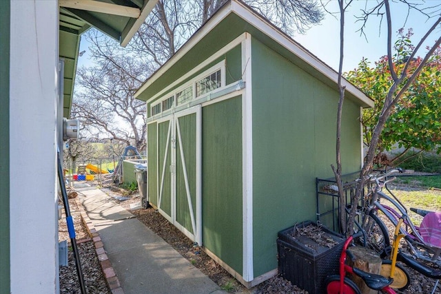 view of outbuilding featuring an outdoor structure